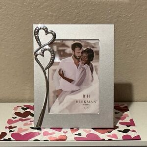 Silver Frame with Embossed Hearts Design. New